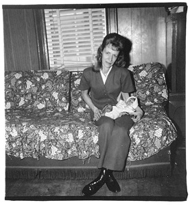 Arbus-Diane-Woman-with-her-baby-monkey